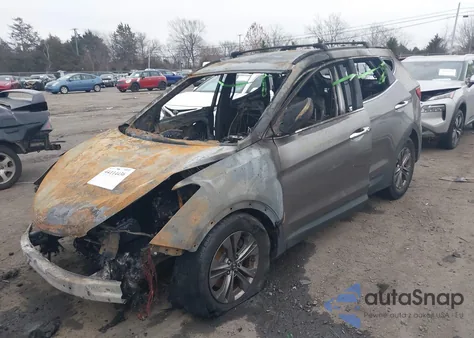 2015 Hyundai Santa Fe Sport 2.4L z USA, uszkodzony, nr VIN 5XYZUDLB9FG235404